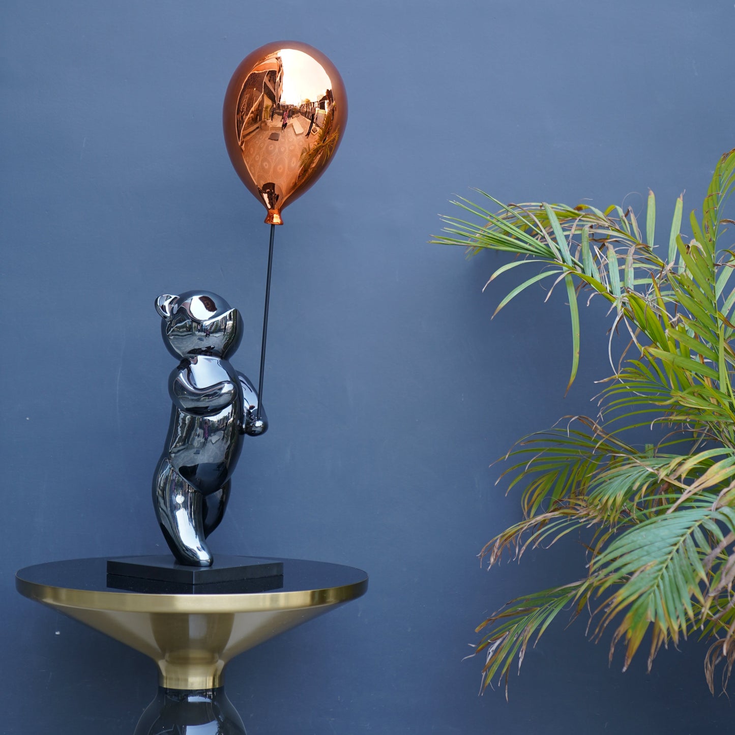 Enchanting Bear with Orange Balloon Figurine