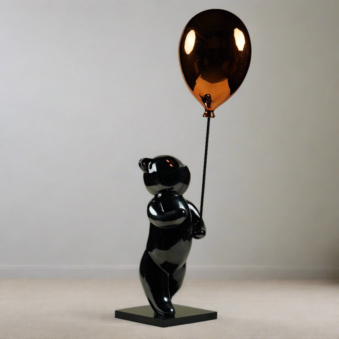 Enchanting Bear with Orange Balloon Figurine