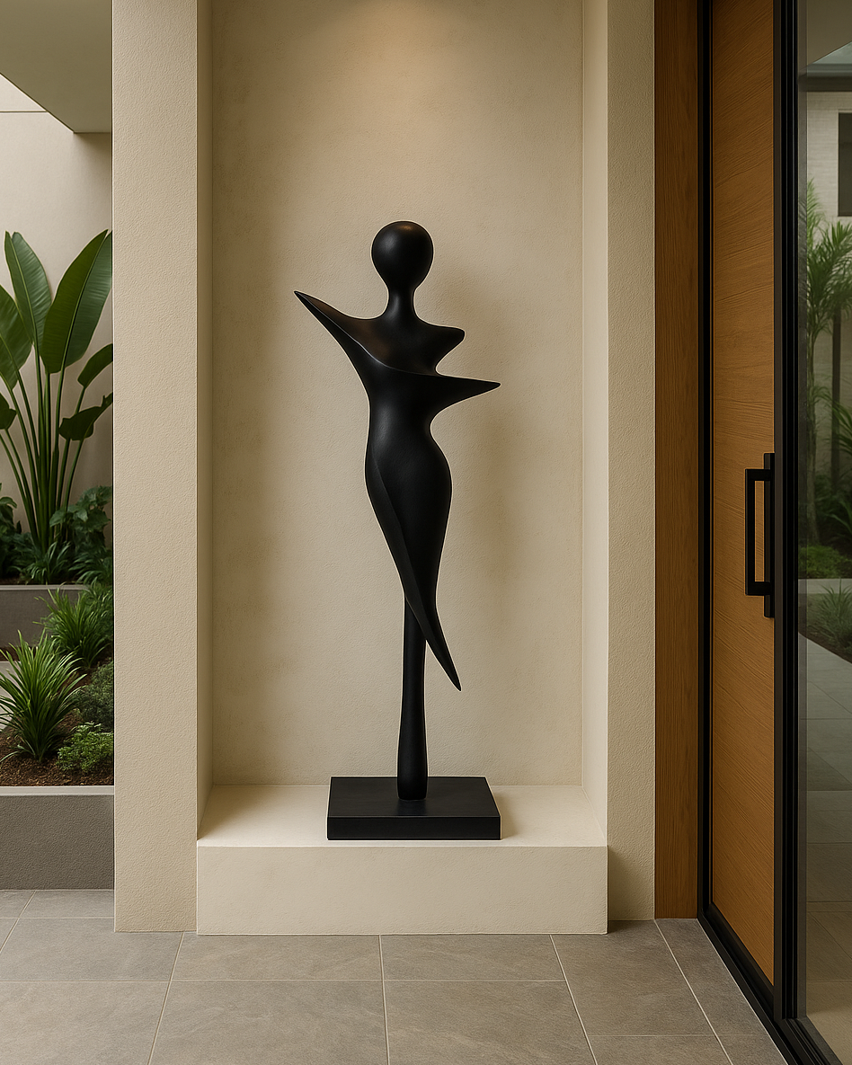Modern black sculpture in a well-lit indoor setting with plants and a glass door.