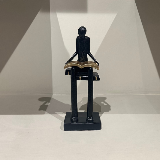 Liber Black Reading Man Sculpture