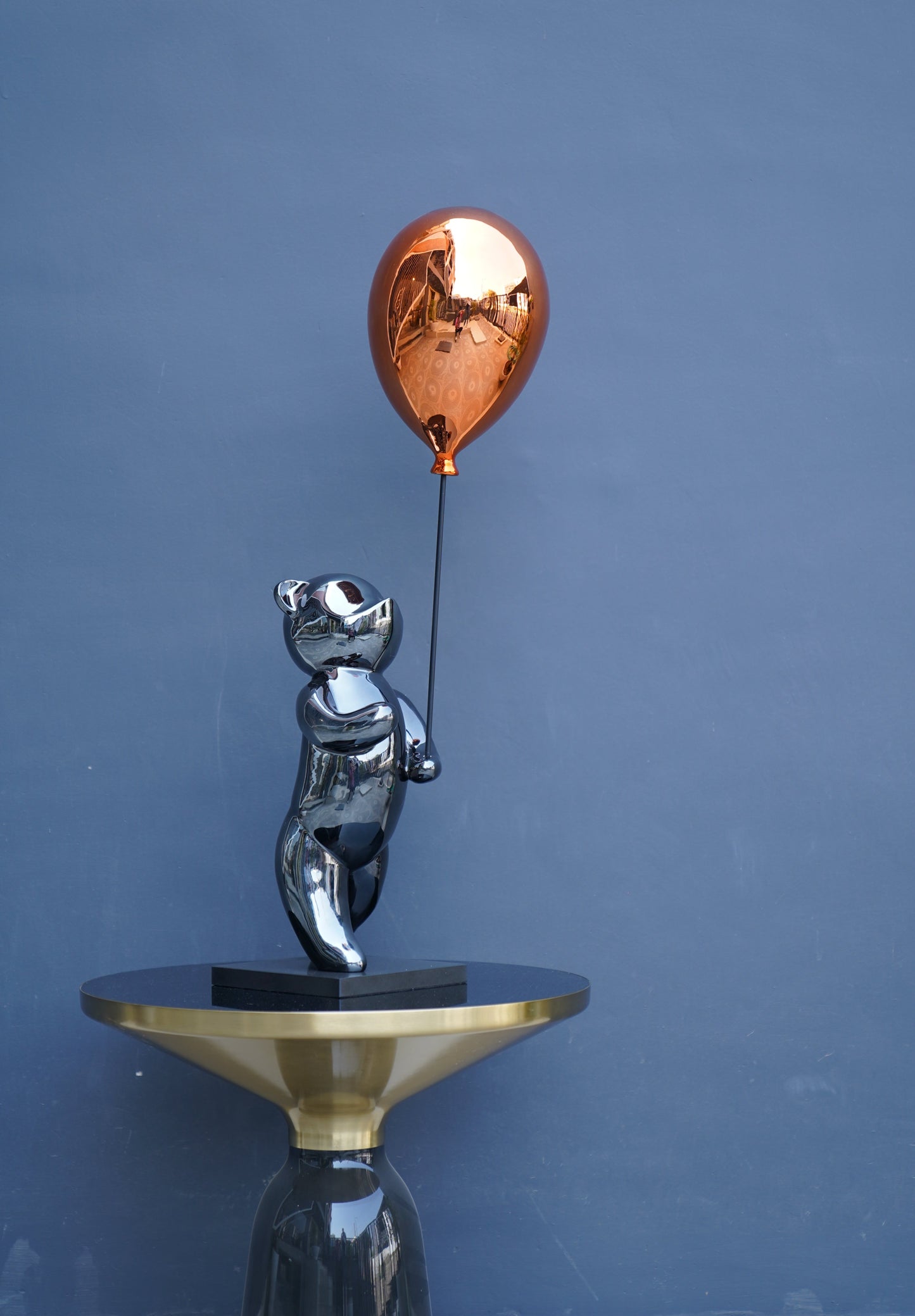 Enchanting Bear with Orange Balloon Figurine