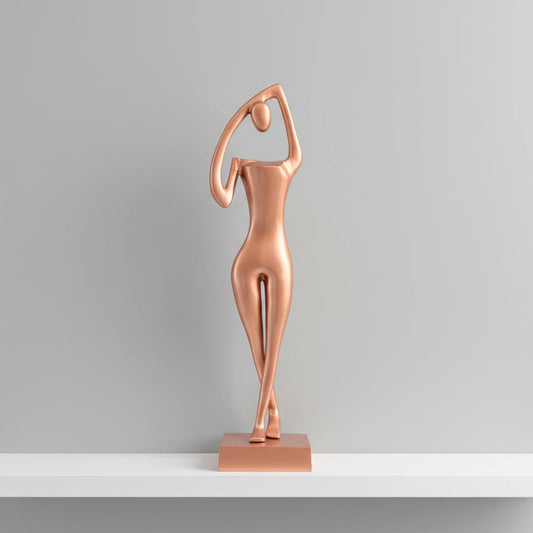 Nude sculpture in a modern living room with large windows and cityscape view